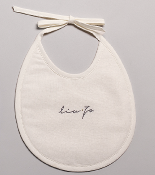 Classic colored bib embroidered in cotton